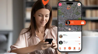 A woman checking the Device Tracker Plus app, which shows her partner has just left work